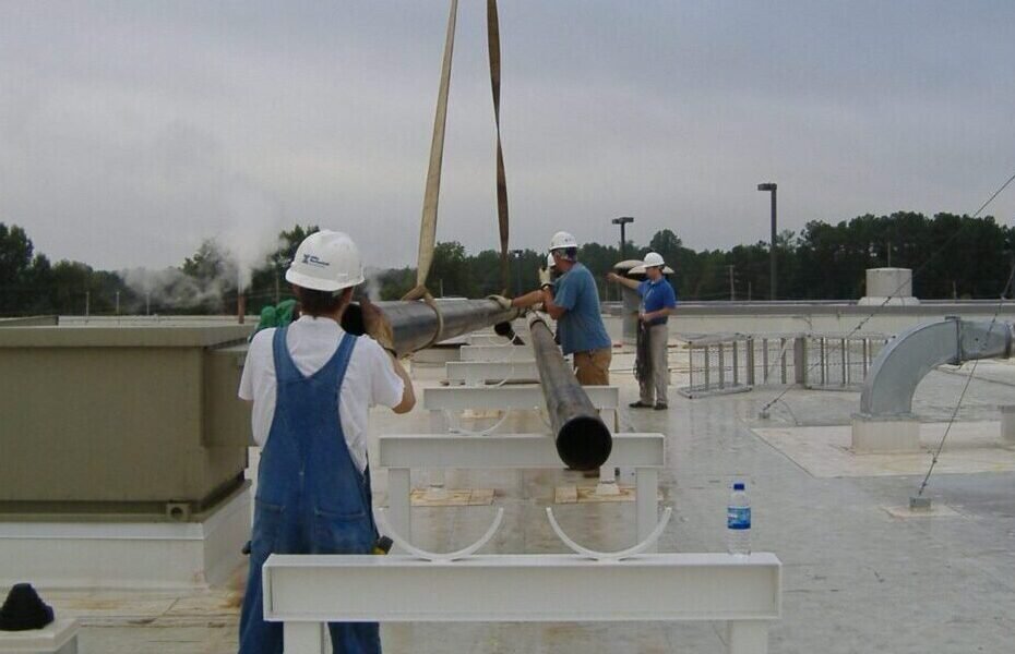 plumbers working on a plumbing service call